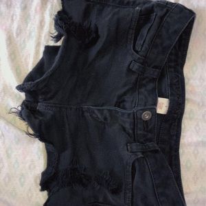 black ripped jean shorts